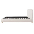 Cama tapizada Brady con tela de lino, cabecero de diseño curvo y patas de madera maciza