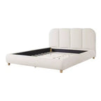 Cama tapizada Brady con tela de lino, cabecero de diseño curvo y patas de madera maciza